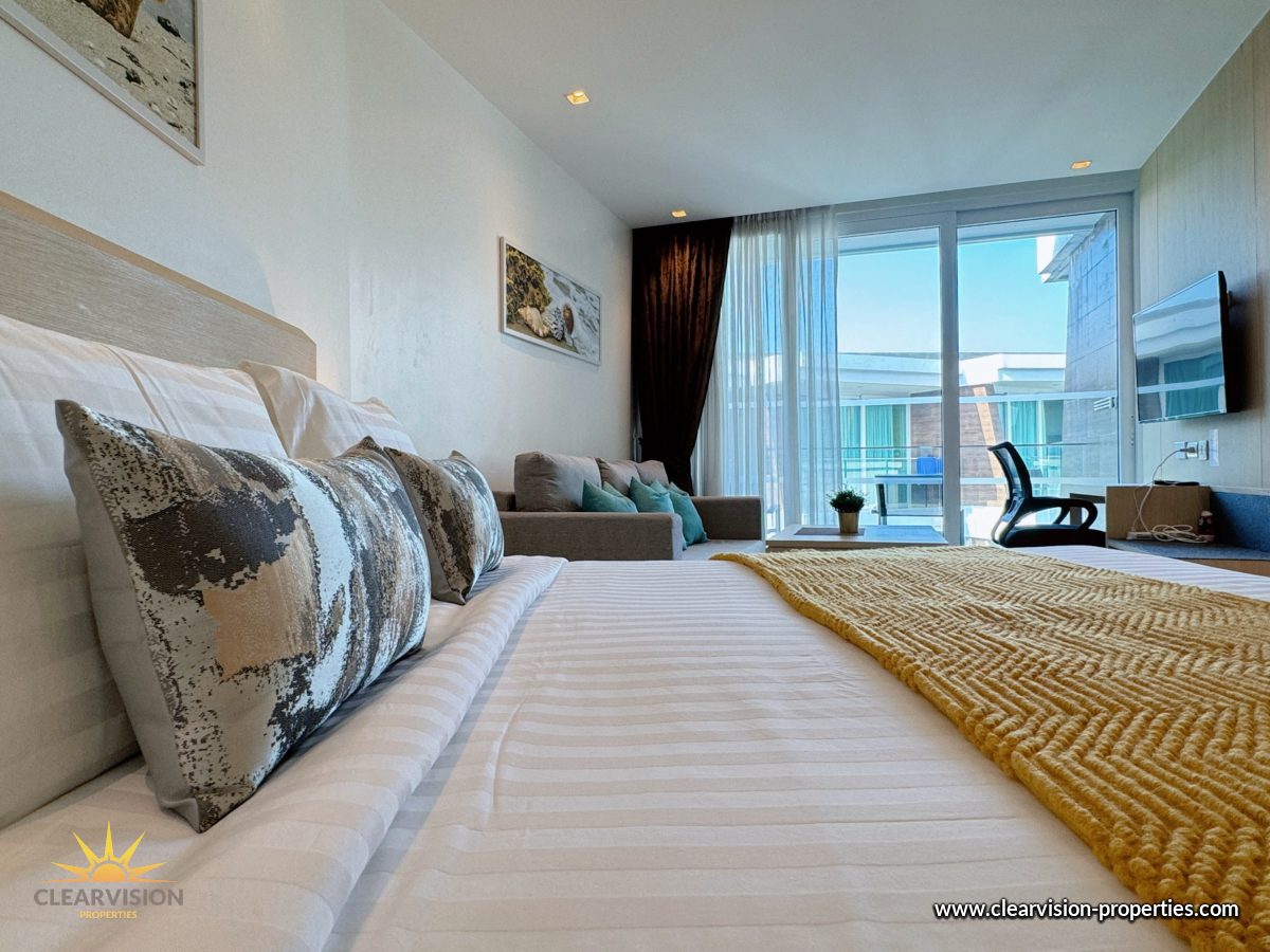Luxury Seaside Suite with Private Balcony and Ocean Views