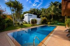 Family Residence with Poolside Lounge and Garden